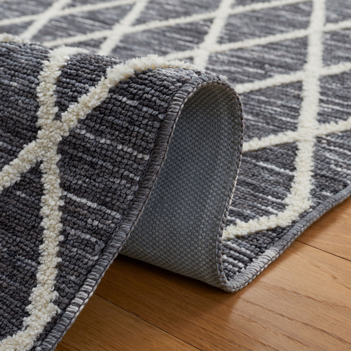 Flexible weave shows sturdy underside and soft pile ideal for busy homes || ECR112F-5 || fold_room