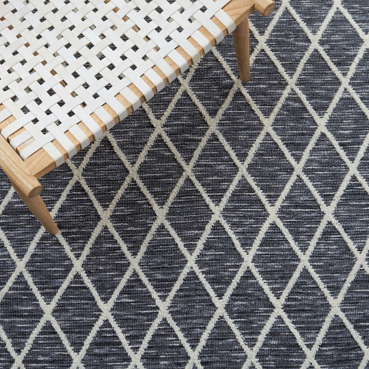 Geometric lattice pairs with dark gray tones to anchor decor with subtle pattern || ECR112F-5 || detail_room