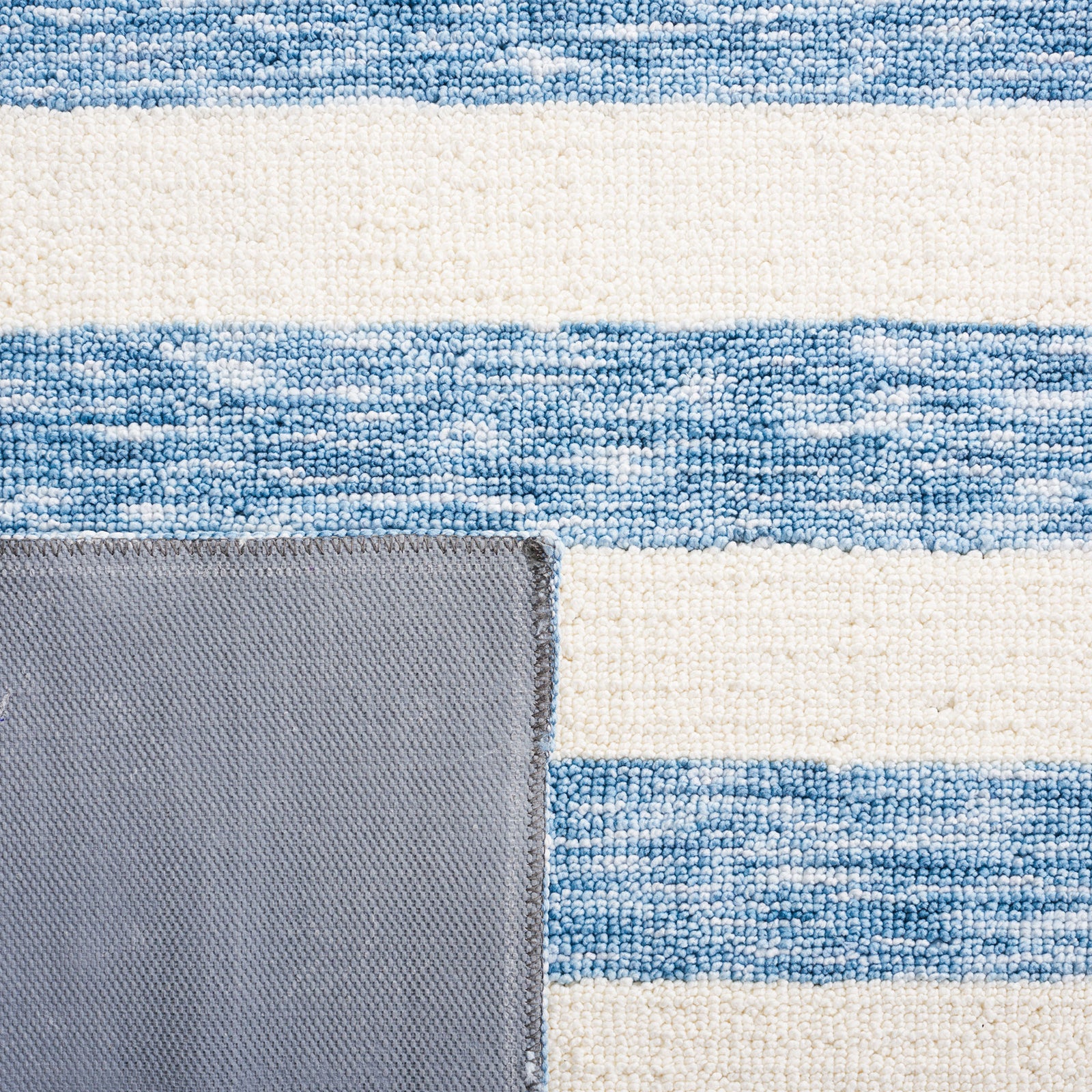 Close-up of the striped surface and sturdy underside highlights everyday-friendly construction || ECR115L-5 || backing_studio