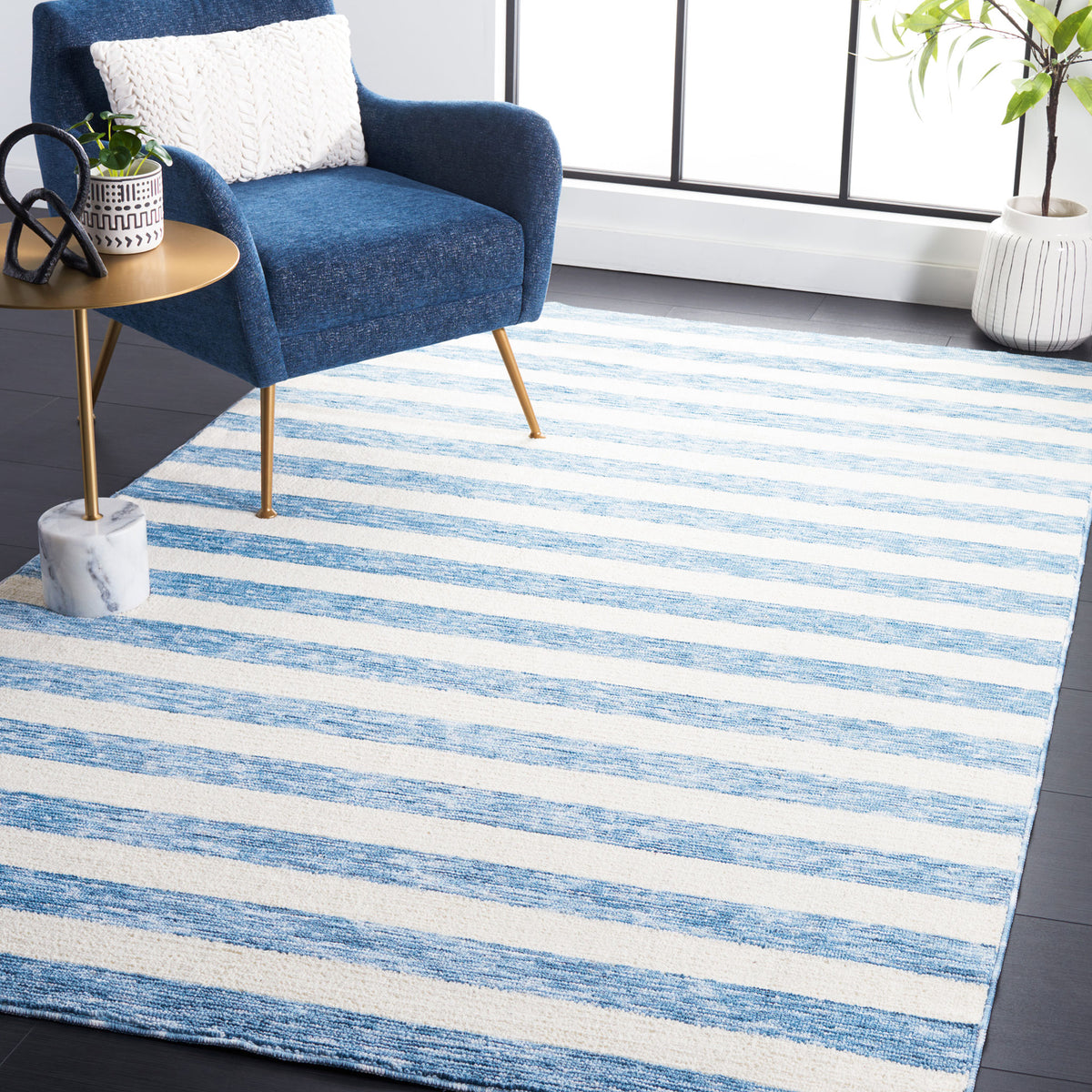Coastal stripes refresh the space, pairing soft texture with easy-to-style light blue and ivory || ECR115L-5 || front_angle_room