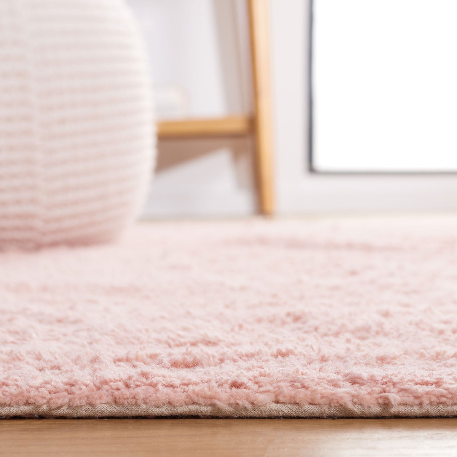 Low, plush texture in rosy pink creates a cozy foundation with a gentle, inviting touch. || ECR211U-5 || detail_room