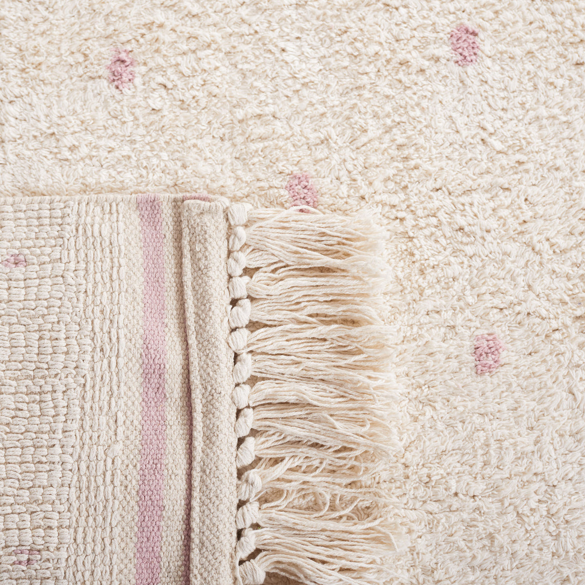 Folded corner reveals sturdy woven backing and tassel detail || ECR212U-5 || backing_room
