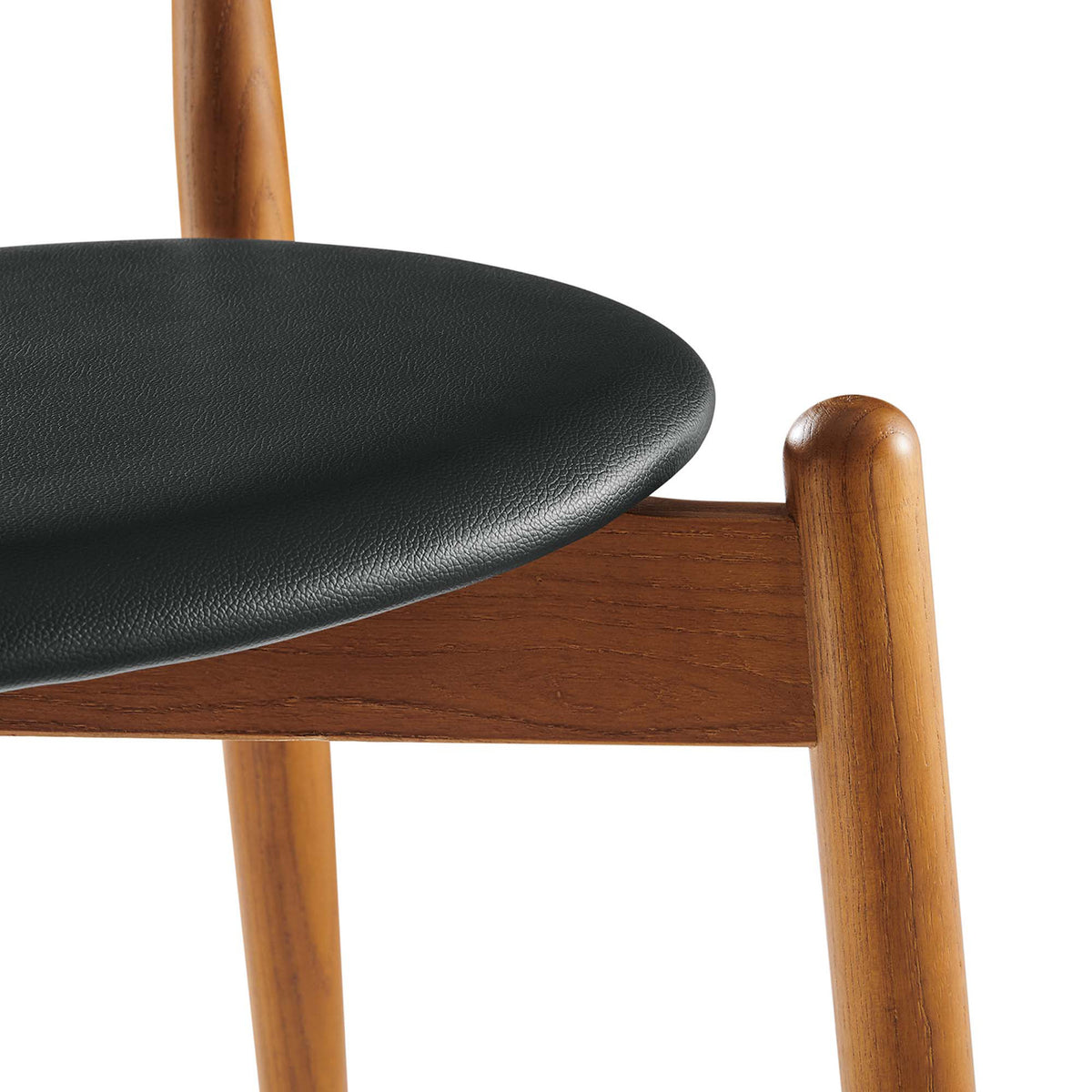 Black vinyl upholstery wraps the rounded seat above a smooth walnut-toned wood frame.