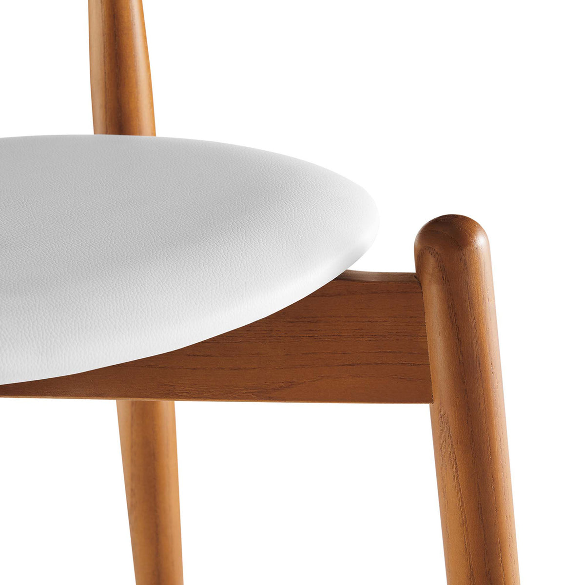 The white vinyl seat has a gently rounded edge above the solid wood frame and tapered leg.