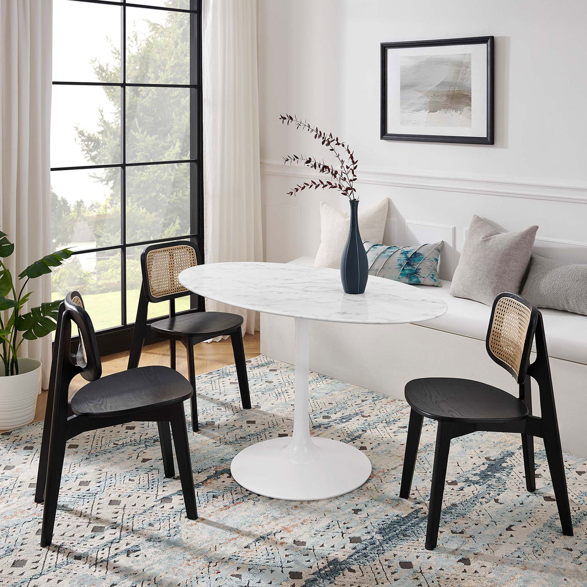 Faux marble pedestal dining table seats four and tucks beautifully into this sunlit breakfast nook || EEI-1134-WHI || front_room