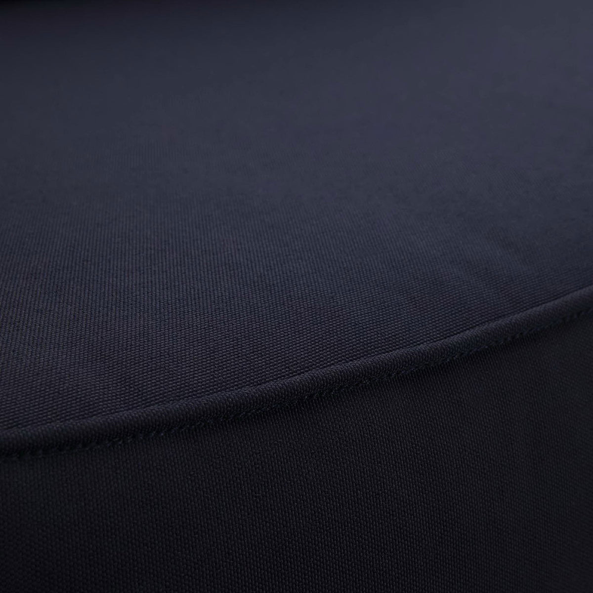 Dark navy outdoor cushion fabric featuring a smooth, tightly woven texture || EEI-1143-NAT-NAV-SET || swatch_studio