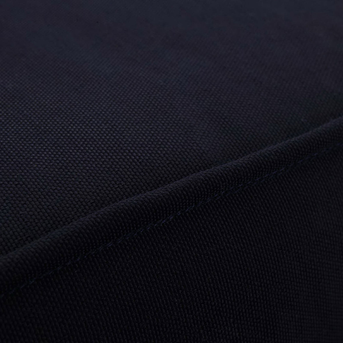 Durable navy outdoor cushion fabric features a tight weave for long lasting support || EEI-1144-NAT-NAV-SET || swatch_studio