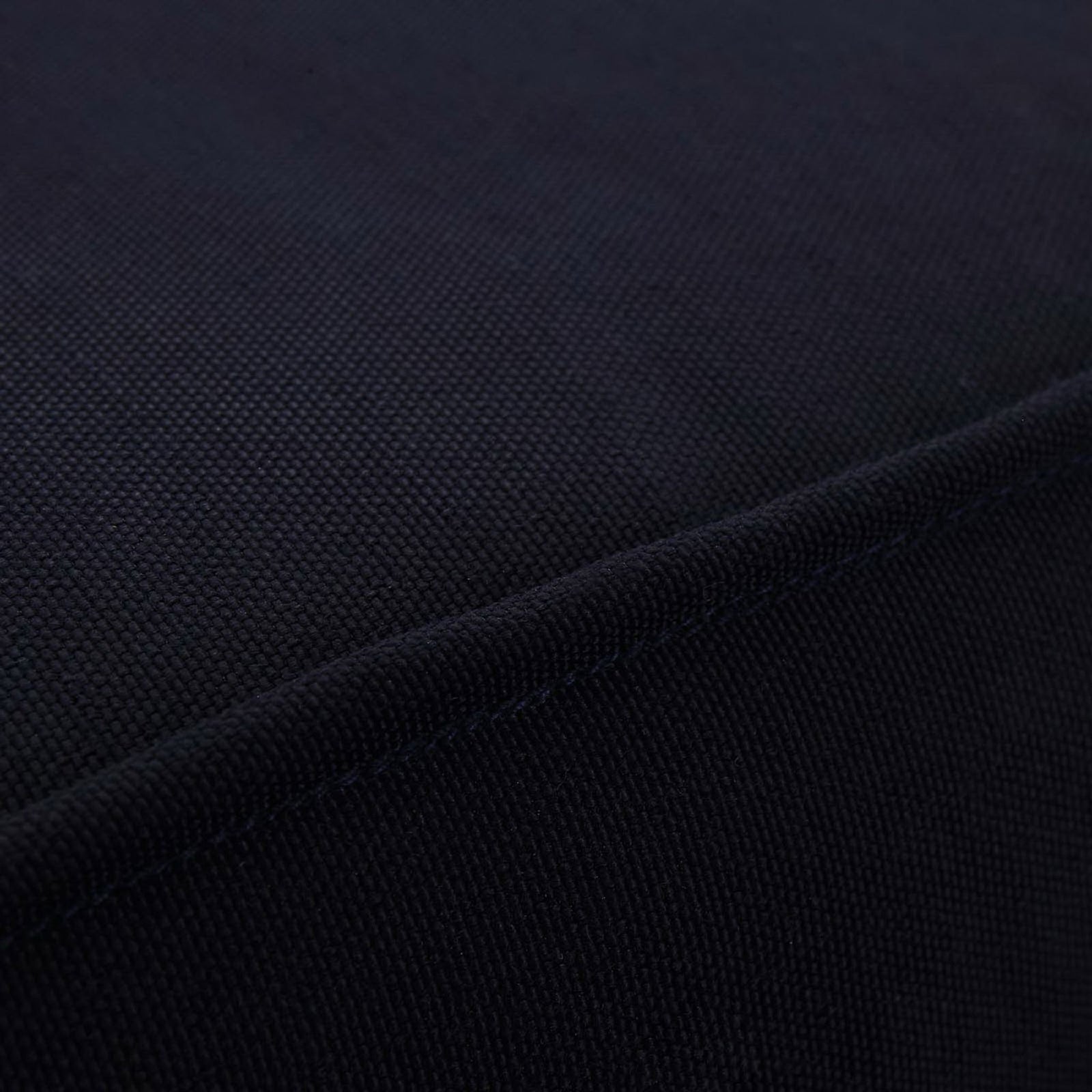 Durable navy outdoor cushion fabric features a tight weave for long lasting support || EEI-1144-NAT-NAV-SET || swatch_studio