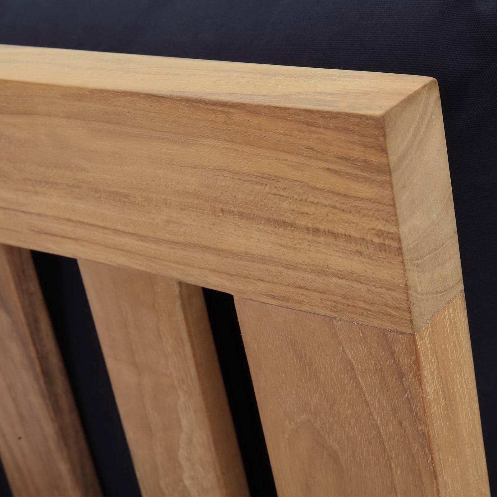 Close-grain teak back rail detail standing out against dark navy upholstery || EEI-1150-NAT-NAV-SET || detail_studio