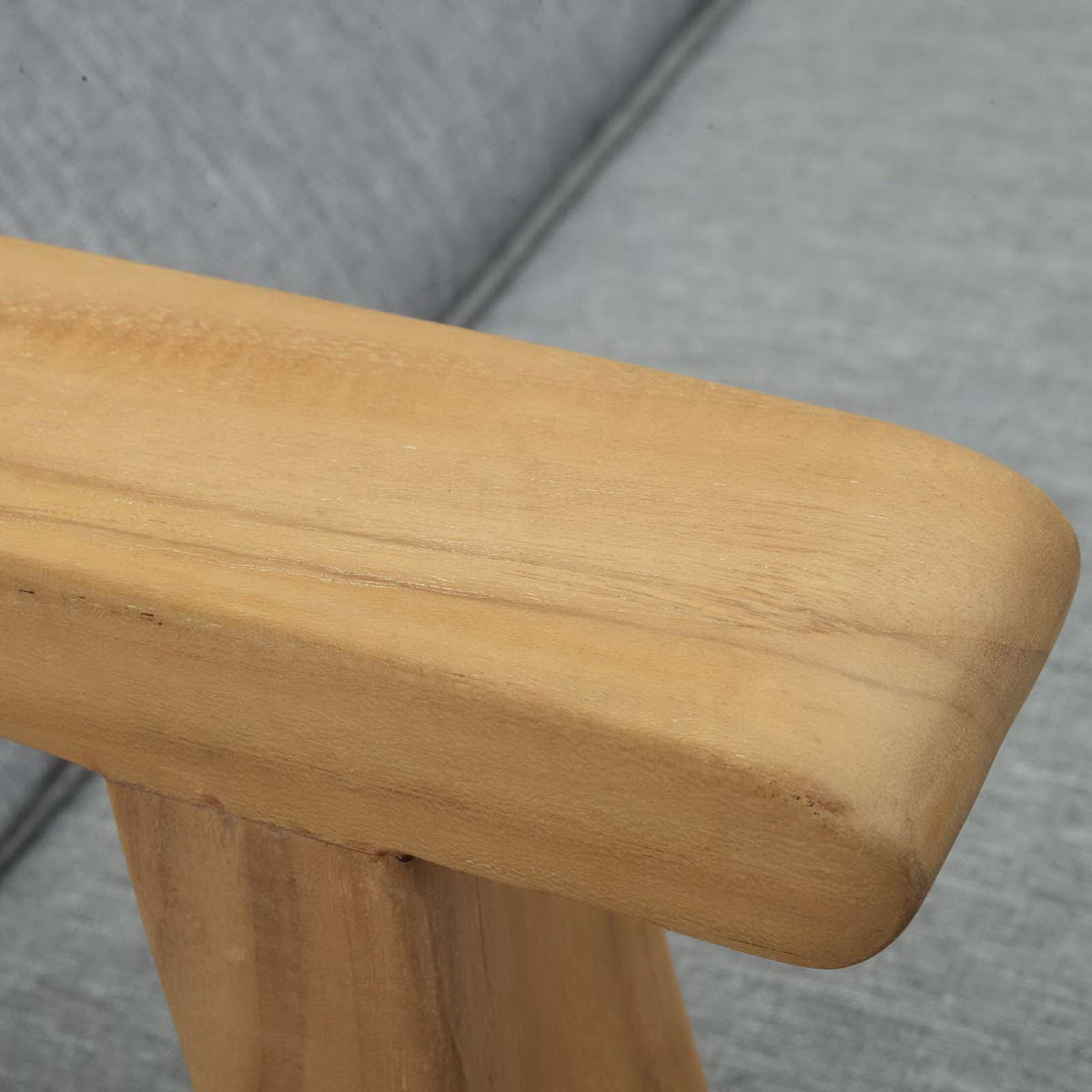 Smooth rounded teak armrest with gently curved edges and visible natural wood grain || EEI-1151-NAT-GRY-SET || detail_studio