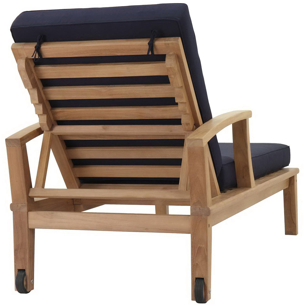 Teak chaise lounge showcasing slatted adjustable backrest, navy cushion ties, and smooth rolling wheels || EEI-1151-NAT-NAV-SET || back_angle_studio