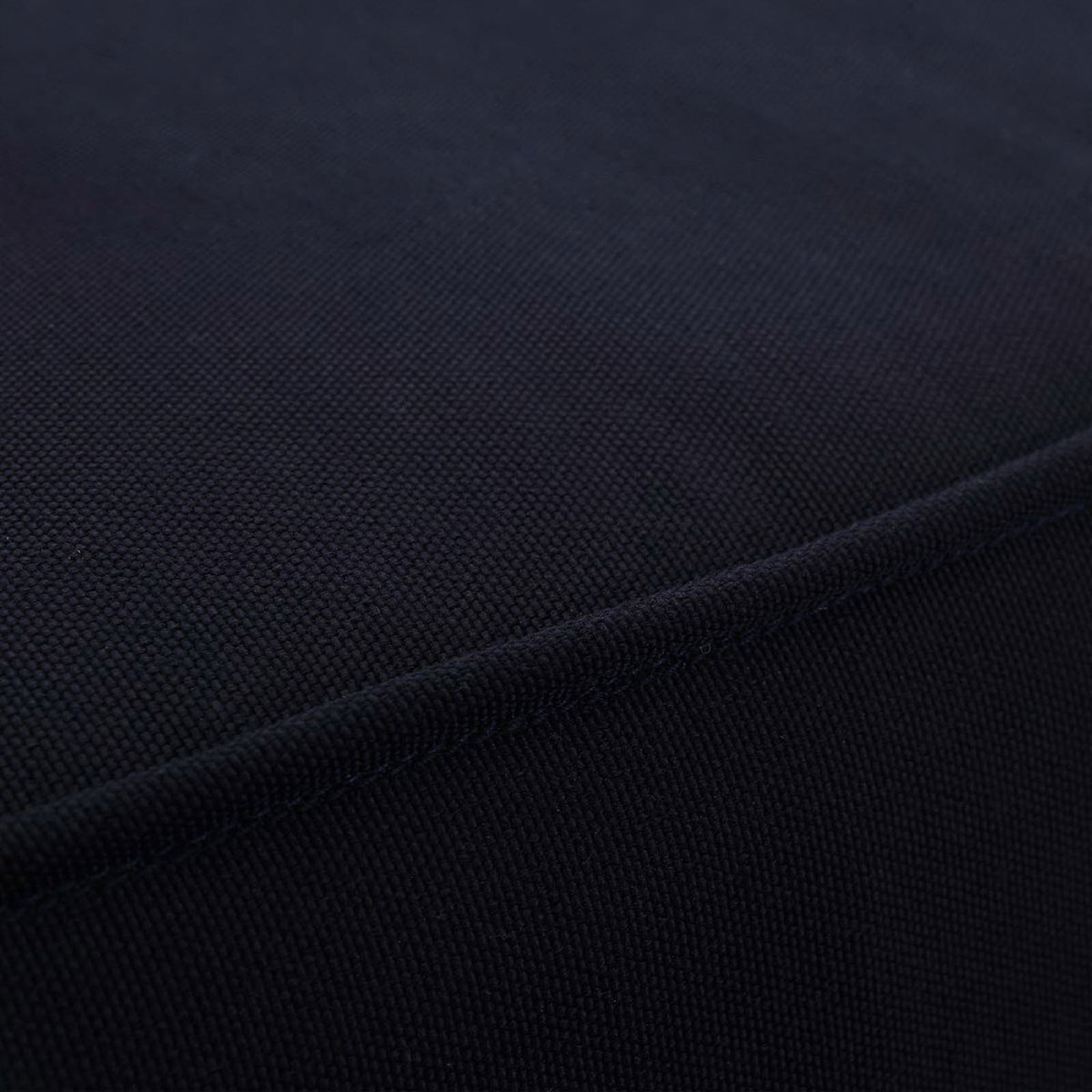 Rich navy outdoor cushion fabric with tightly woven texture. || EEI-1152-NAT-NAV-SET || swatch_studio