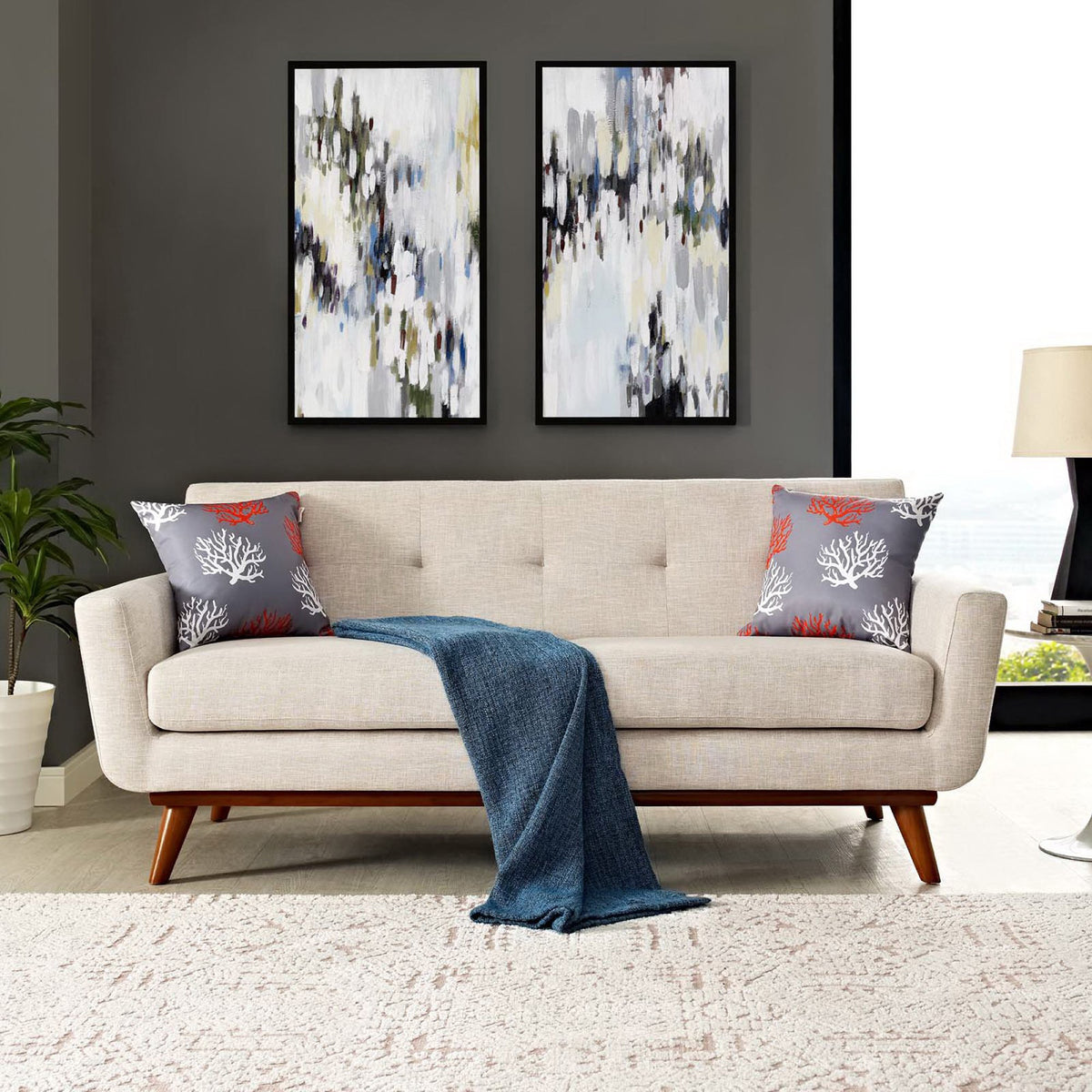Neutral beige upholstery and tailored seating lend this tufted loveseat a relaxed, welcoming feel