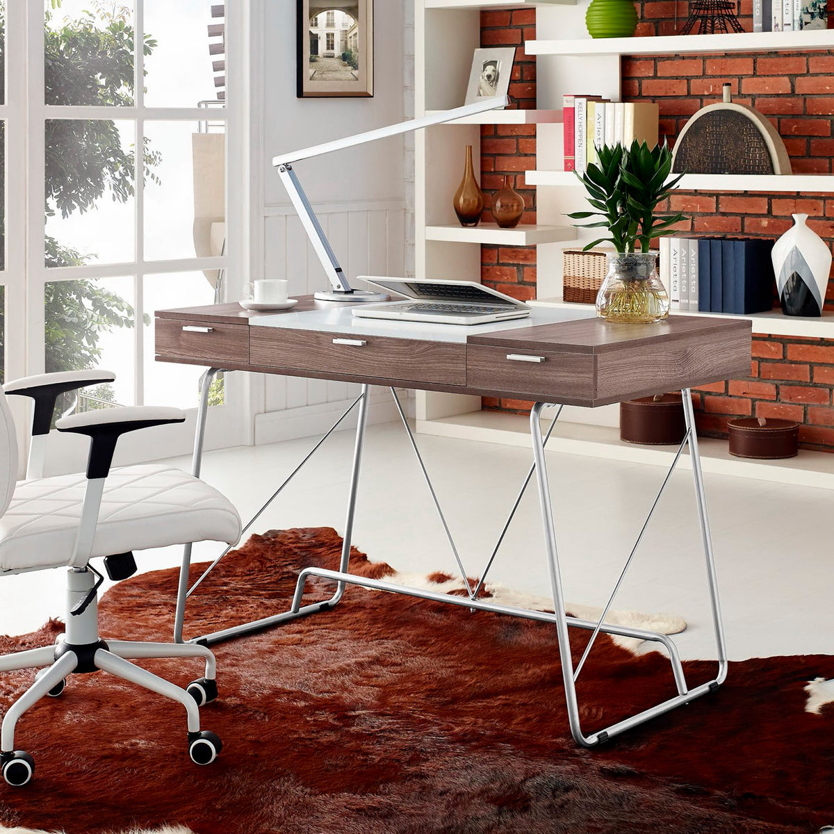 Three drawers and a spacious two-tone desktop bring sleek storage to a home office.