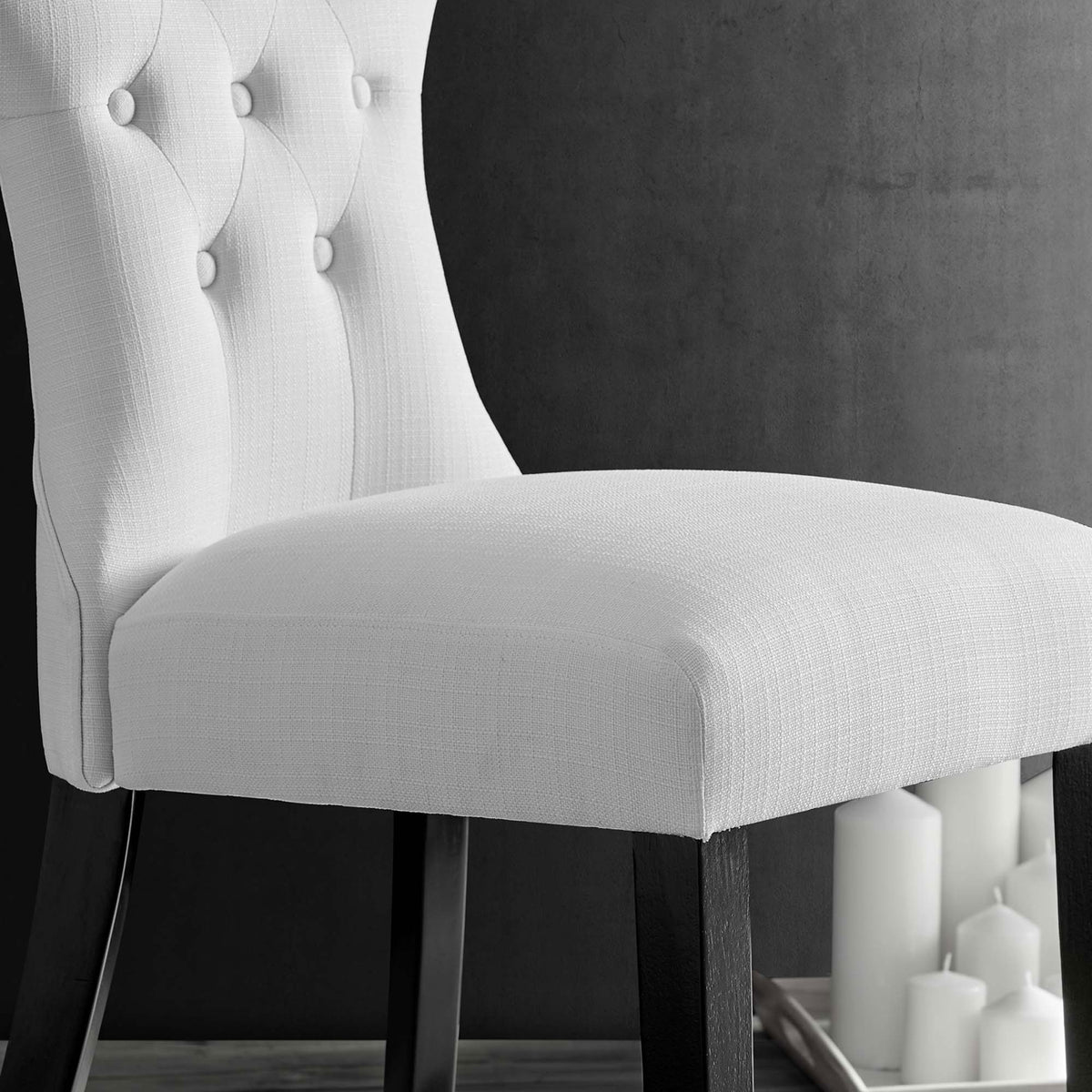 Soft white seat and lower back upholstery paired with rich wood legs for an inviting modern vignette || EEI-1380-WHI || detail_room