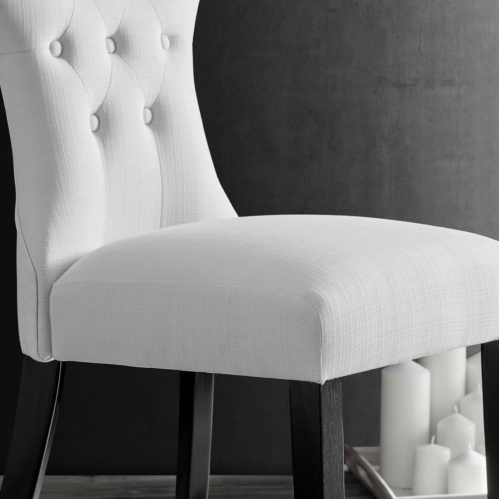 Soft white seat and lower back upholstery paired with rich wood legs for an inviting modern vignette || EEI-1380-WHI || detail_room