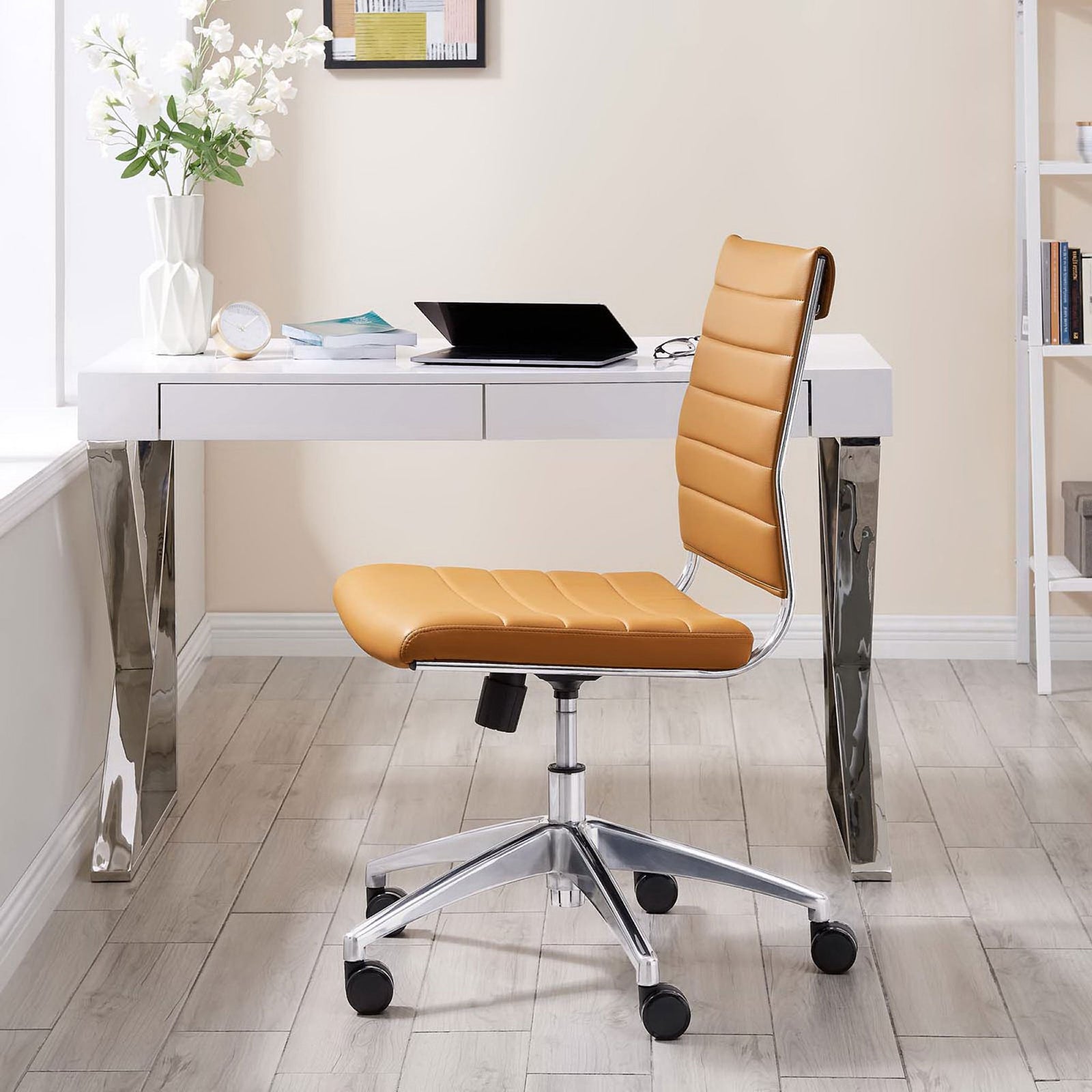 Tan armless office chair paired with a modern chrome-leg desk in a bright home workspace || EEI-1525-TAN || side_room
