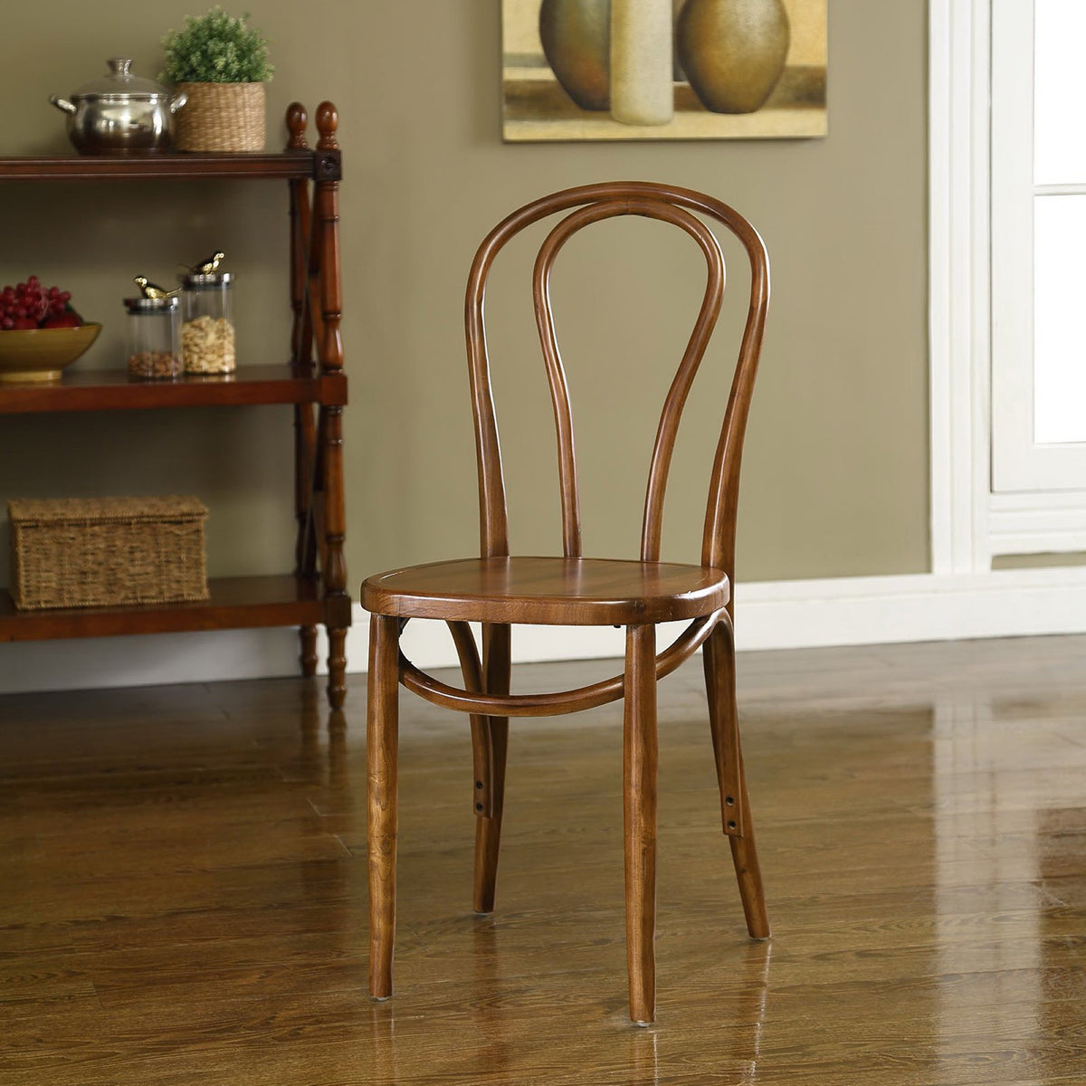 Warm walnut-tone dining chair pairs an open back with curved wood braces and a smooth seat