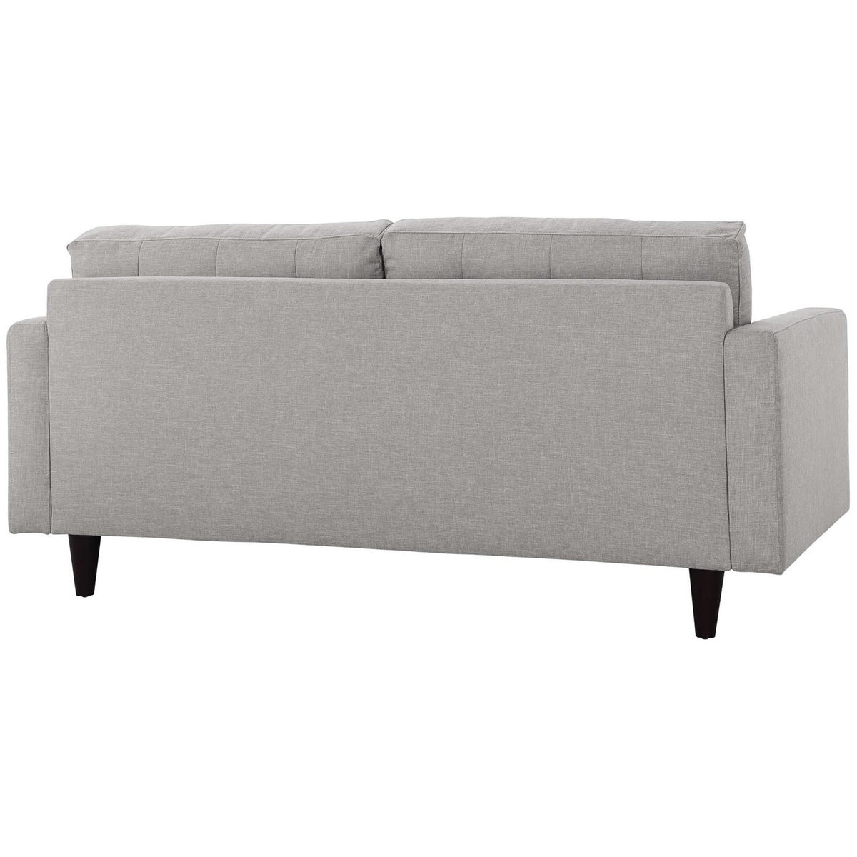 A smooth light gray upholstered back and squared arms stand on dark tapered wood legs.