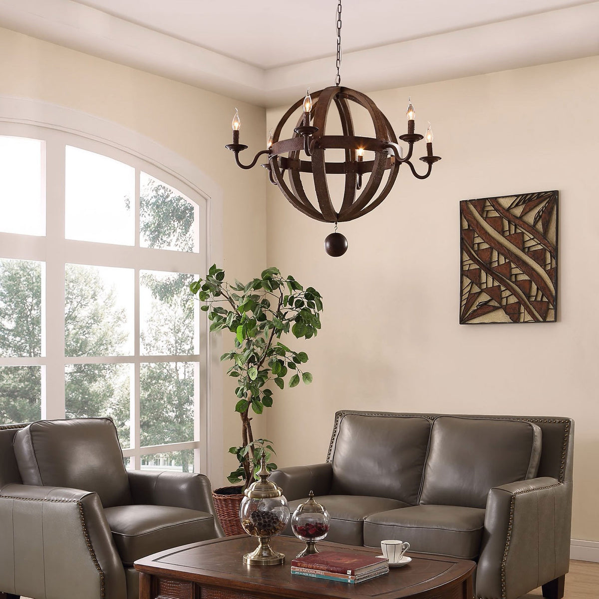 Chandelier warms a cozy living room with six glowing lights and a rustic wood ringed frame || EEI-1569 || front_on_room