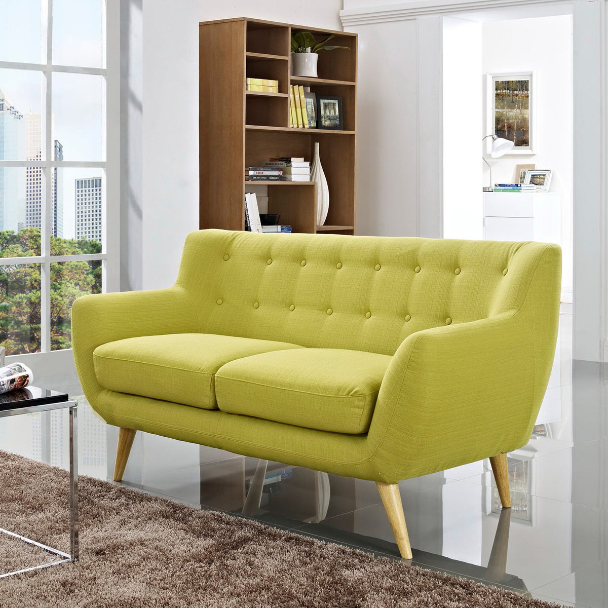 Bright wheatgrass green loveseat with tufted upholstery, cushioned seating, and sculpted arms