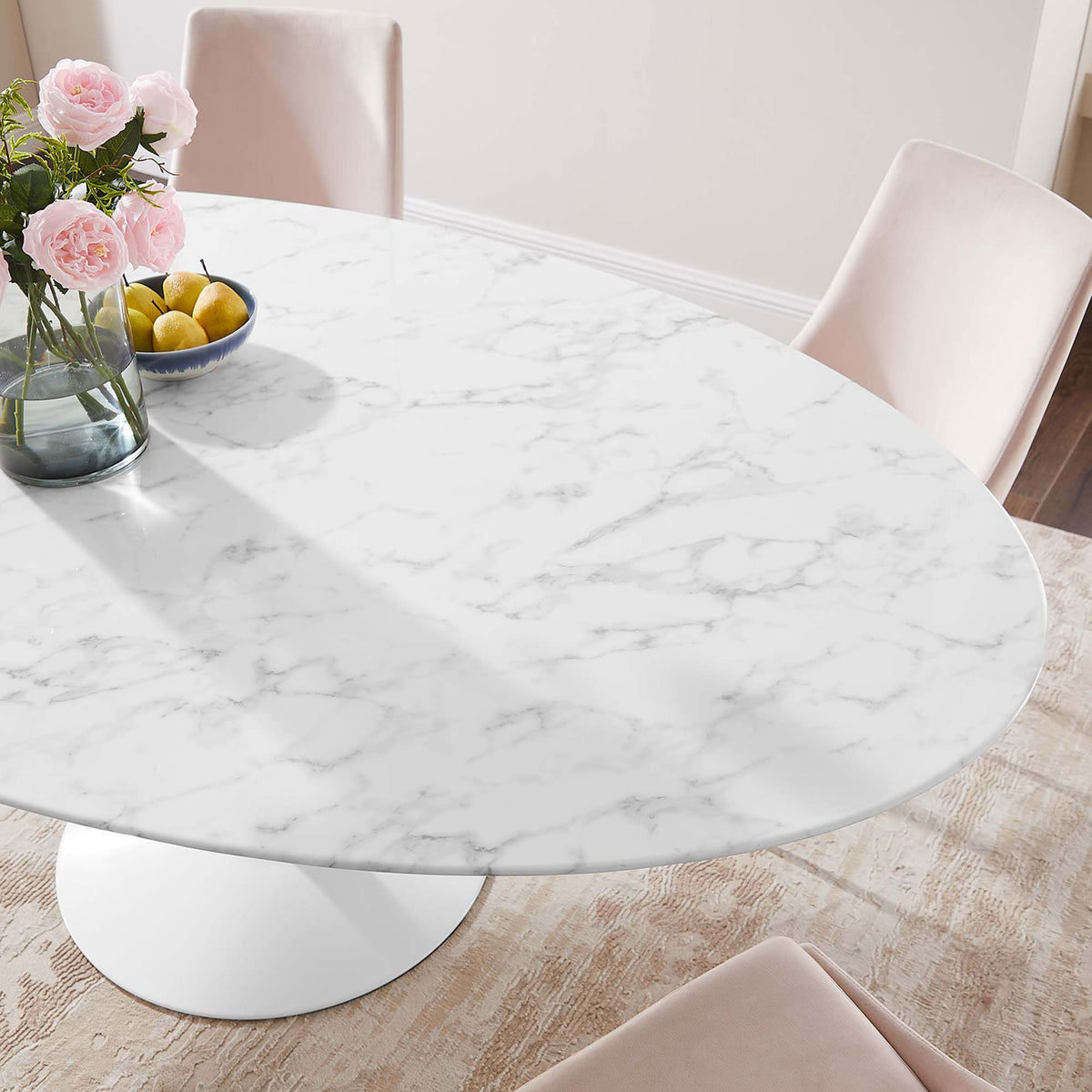 Elegant faux marble tabletop pairs with blush chairs and gold legs for a refined dining look || EEI-1659-WHI || detail_room