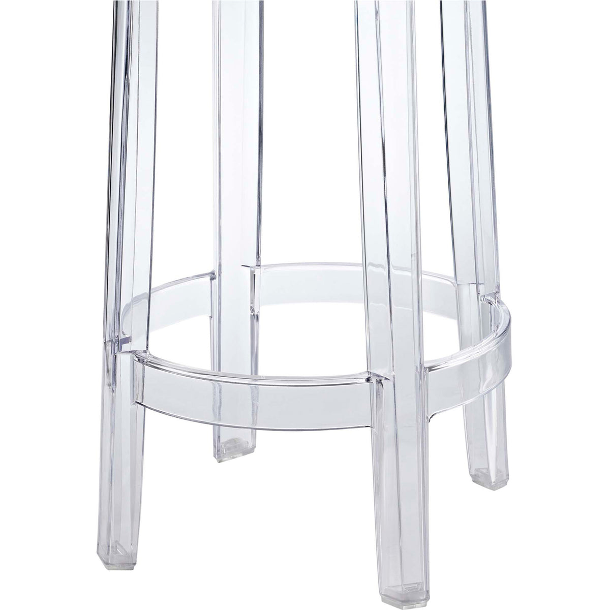 Tapered clear legs meet a ring-shaped footrest for steady support without visual bulk.