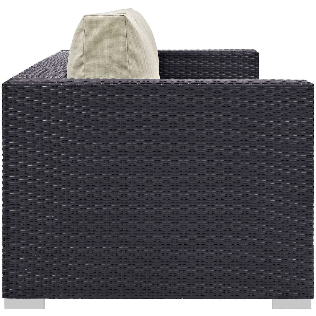 Boxy espresso wicker sofa arm and woven rattan sides pair with thick beige cushions for relaxed outdoor seating. || EEI-1844-EXP-BEI || side_studio