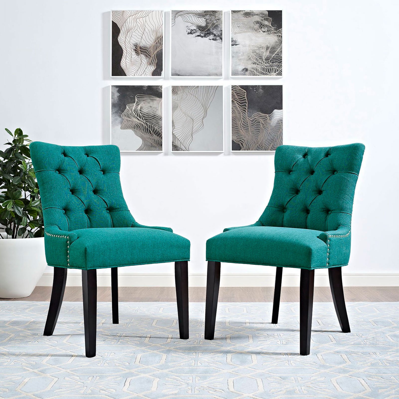 Pair of teal tufted dining chairs adding vibrant color and elegance to a modern dining space || EEI-2223-TEA || front_angle_room