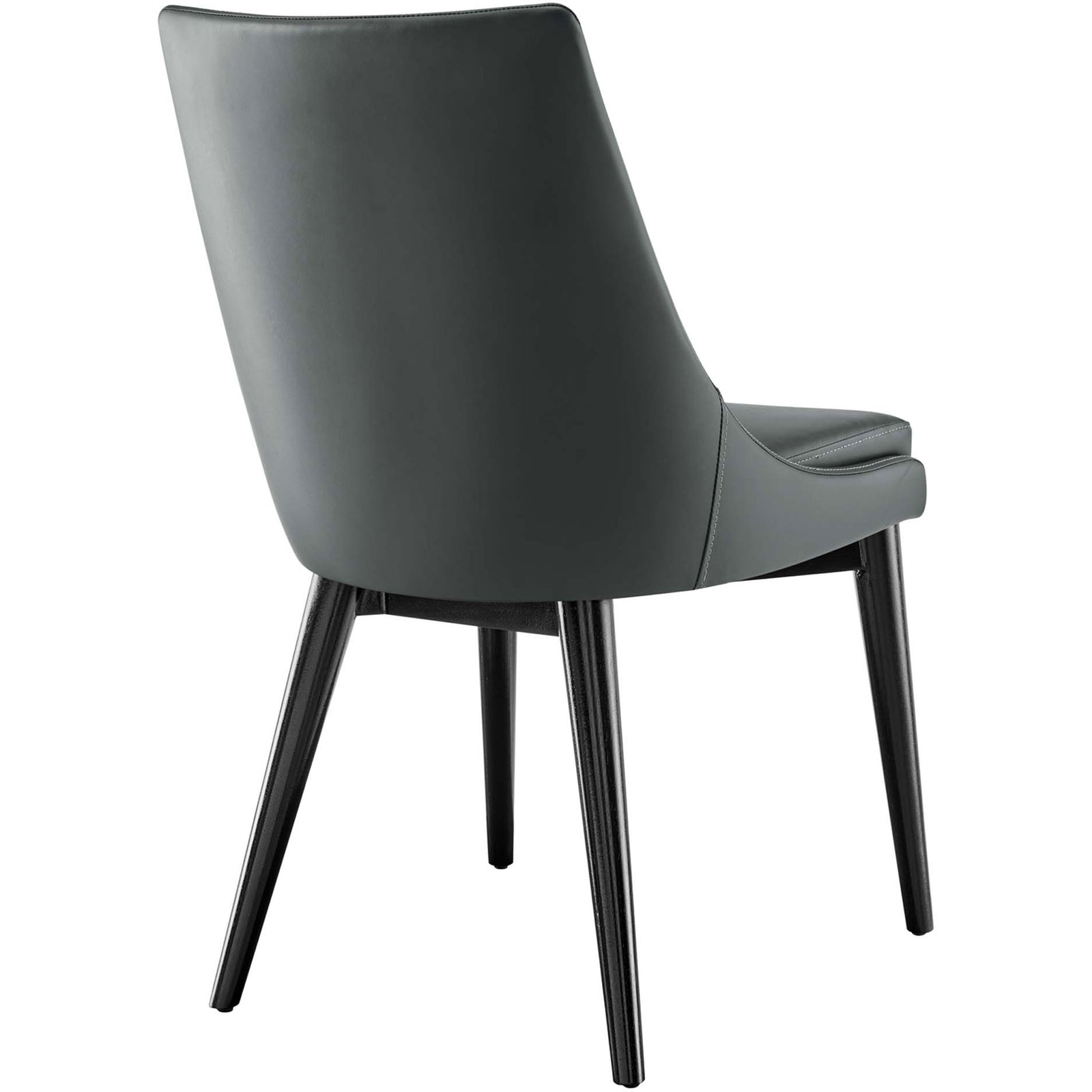 Gray vegan leather dining chair featuring smooth wraparound back and sturdy black wood base || EEI-2226-GRY || back_angle_studio