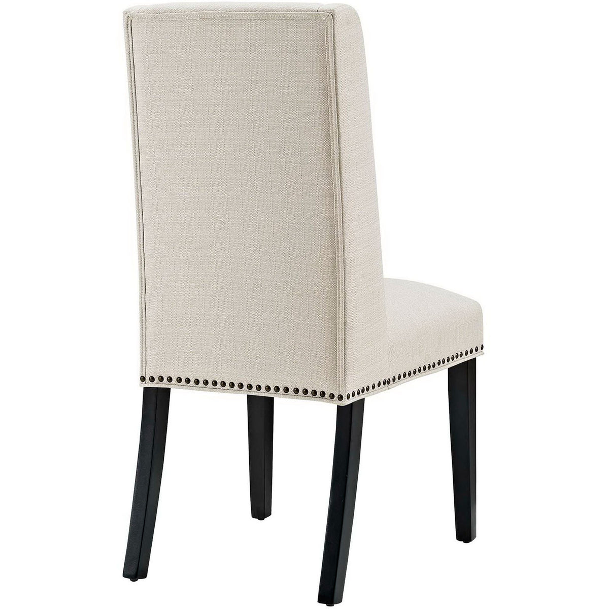 Beige fabric dining chair with smooth high backrest, nailhead border, and slim tapered legs. || EEI-2233-BEI || back_angle_studio