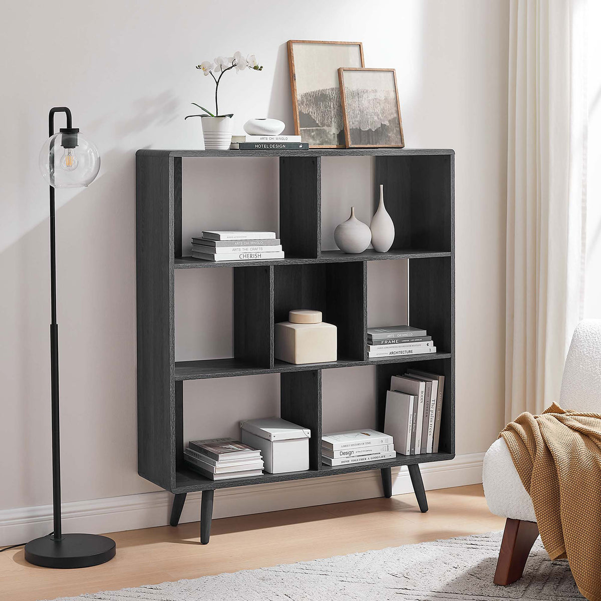 Modern charcoal bookcase elevates living spaces with versatile open storage || EEI-2529-CHA || front_angle_room