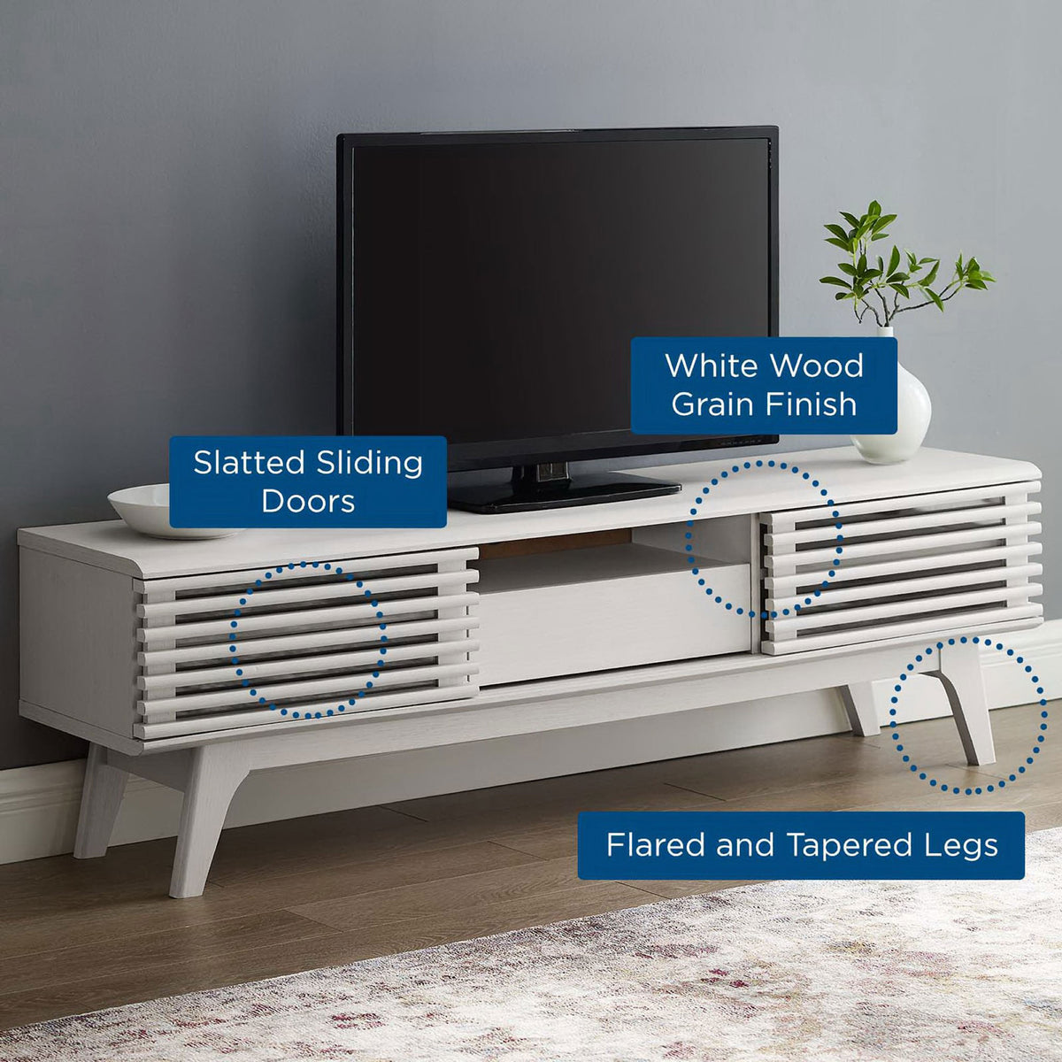 Feature callouts labeling white wood grain finish, slatted doors, and tapered legs on TV stand || EEI-2541-WHI || callout_room