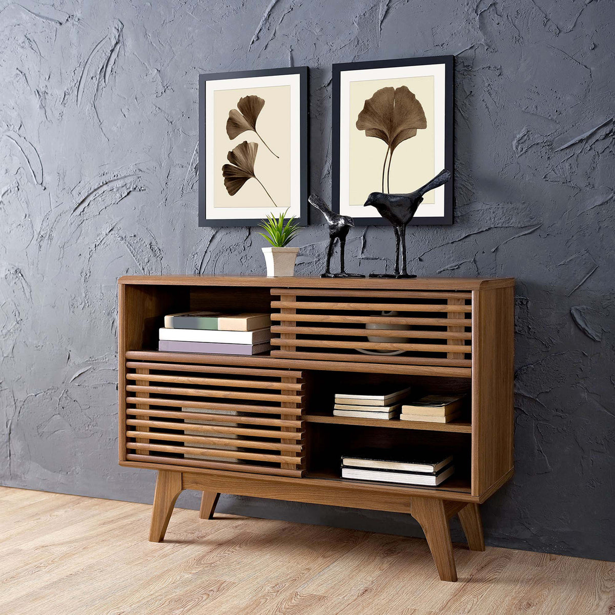 Slatted doors and open shelves offer flexible space for books and decor.