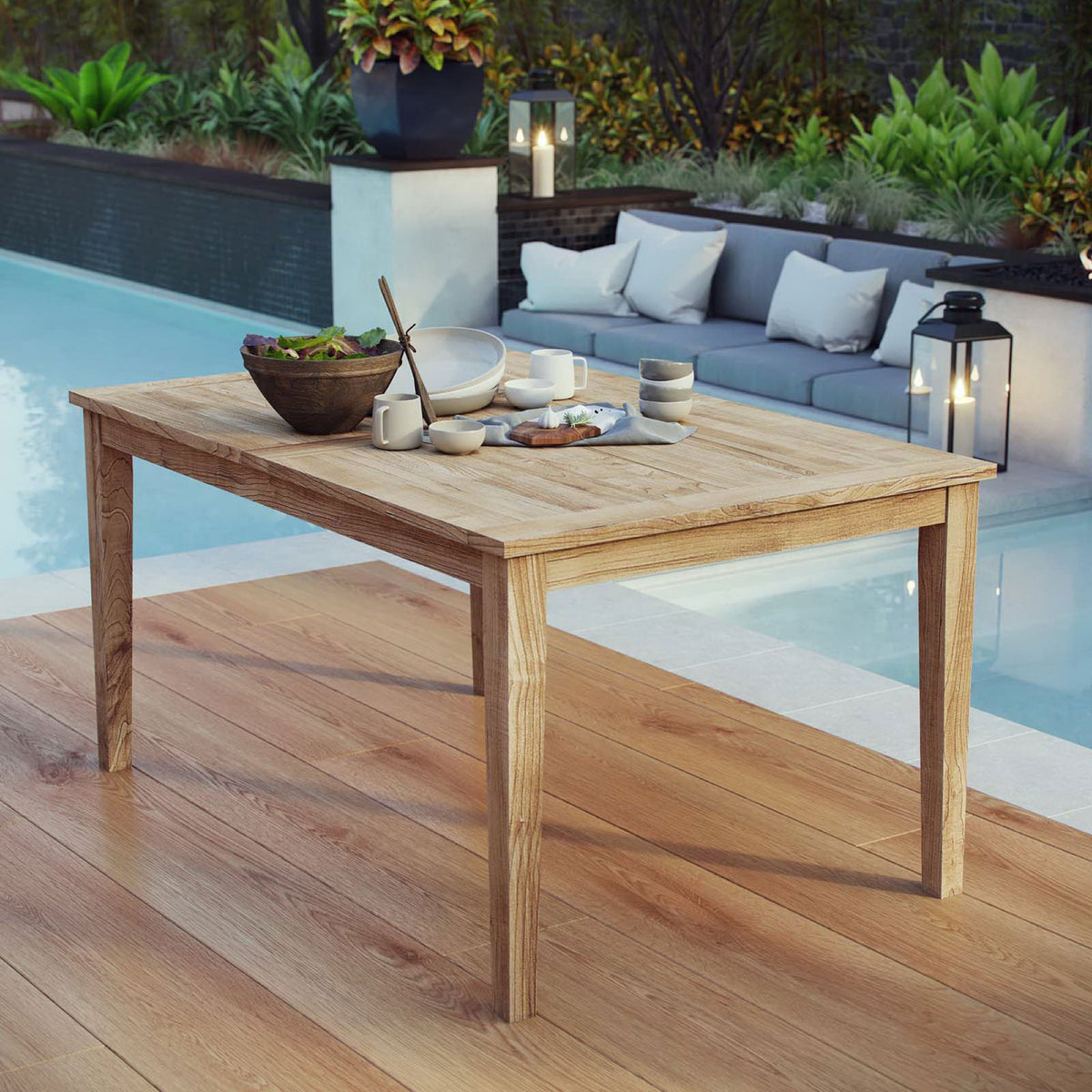 Teak patio dining table set for a casual outdoor meal beside the pool || EEI-2716-NAT || front_angle_room