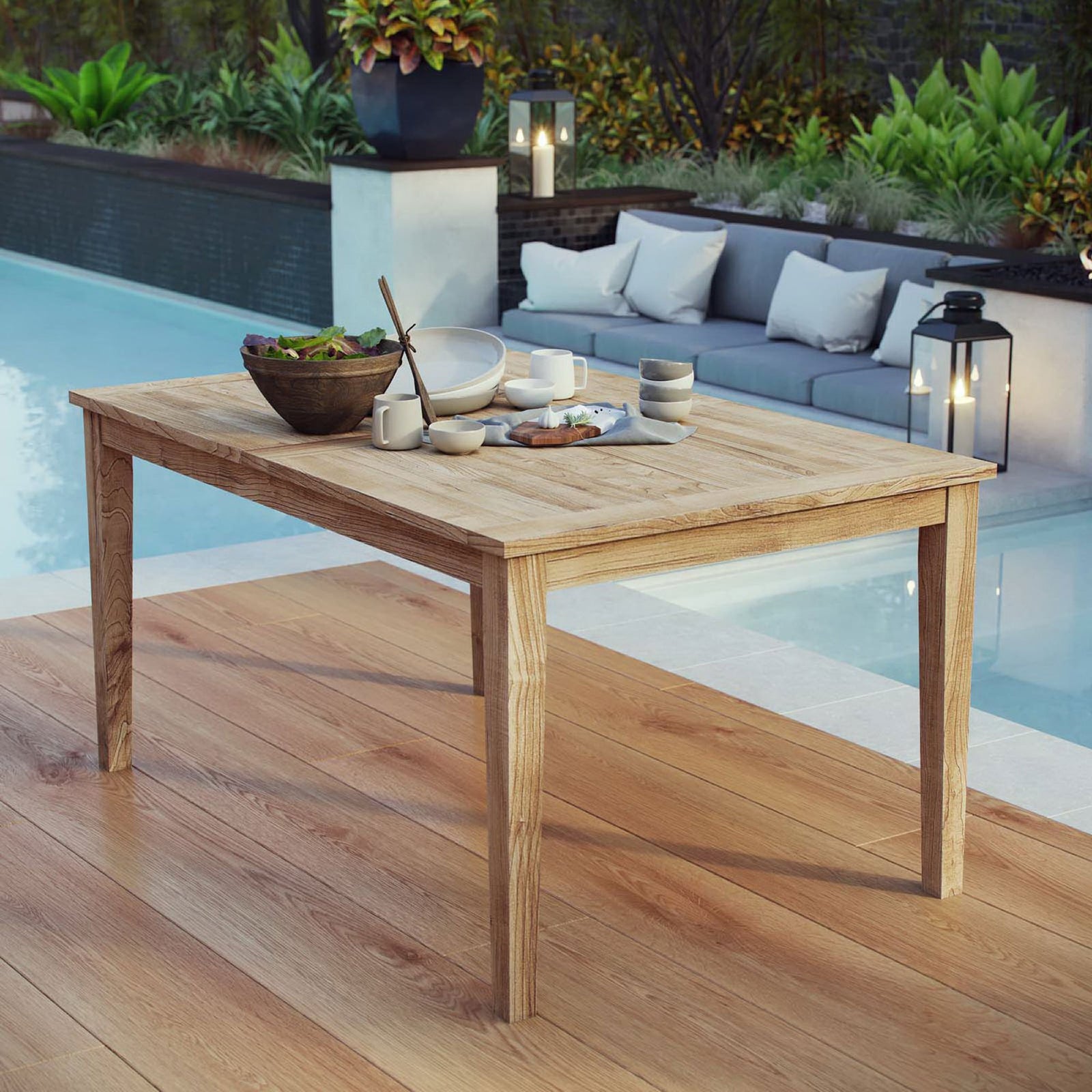 Teak patio dining table set for a casual outdoor meal beside the pool || EEI-2716-NAT || front_angle_room