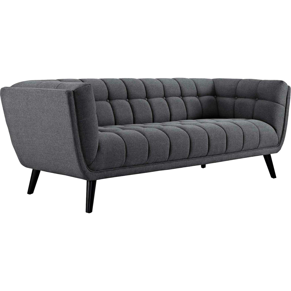 Plush gray sofa with a deep, channel-tufted seat, sweeping arms and tapered black legs