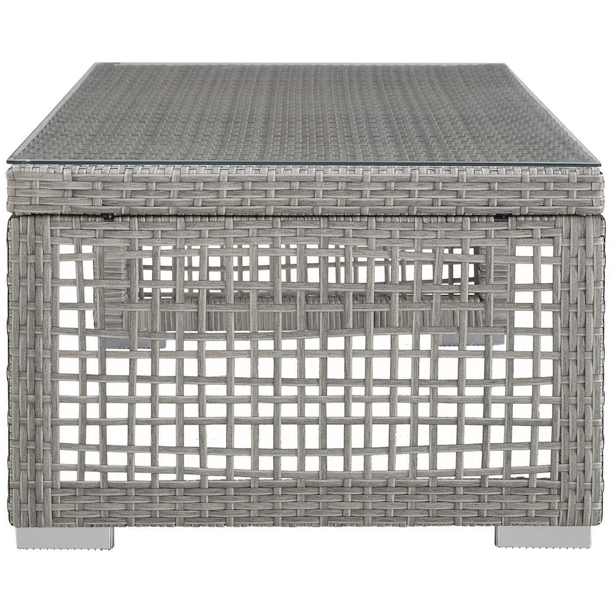 Low-profile gray rattan patio coffee table showcasing woven grid side panels and chrome-finished block feet || EEI-2919-GRY || side_studio