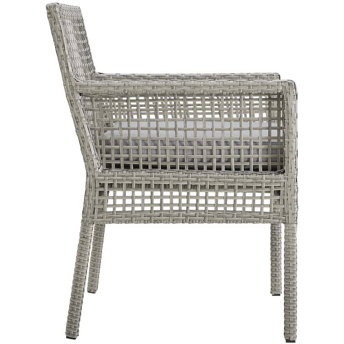 Slim gray wicker frame and square arms create a modern profile for this outdoor dining armchair with cushion || EEI-2920-GRY-GRY || side_studio