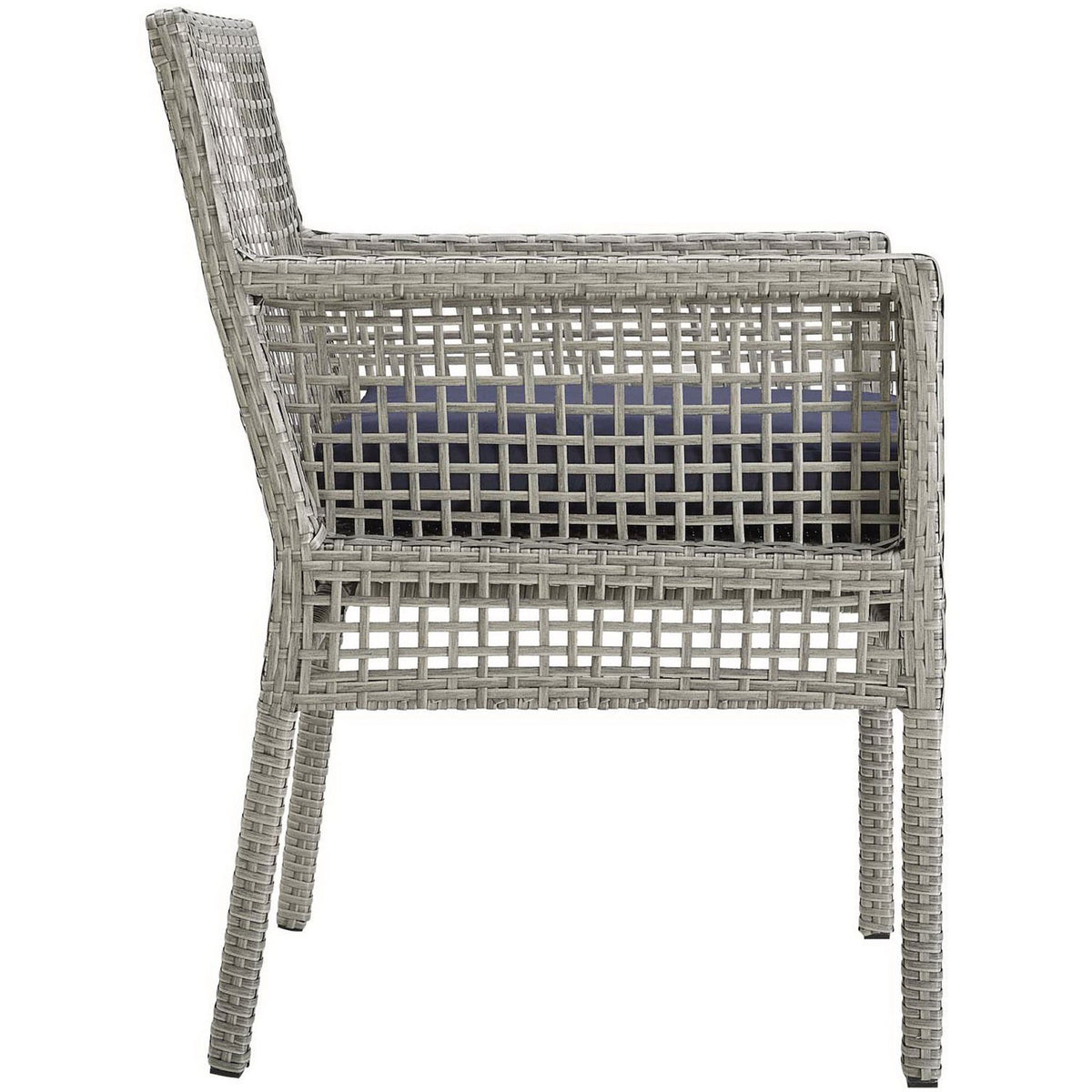 Clean-lined gray wicker frame and square arms pair with a navy cushion for a modern patio dining chair || EEI-2920-GRY-NAV || side_studio