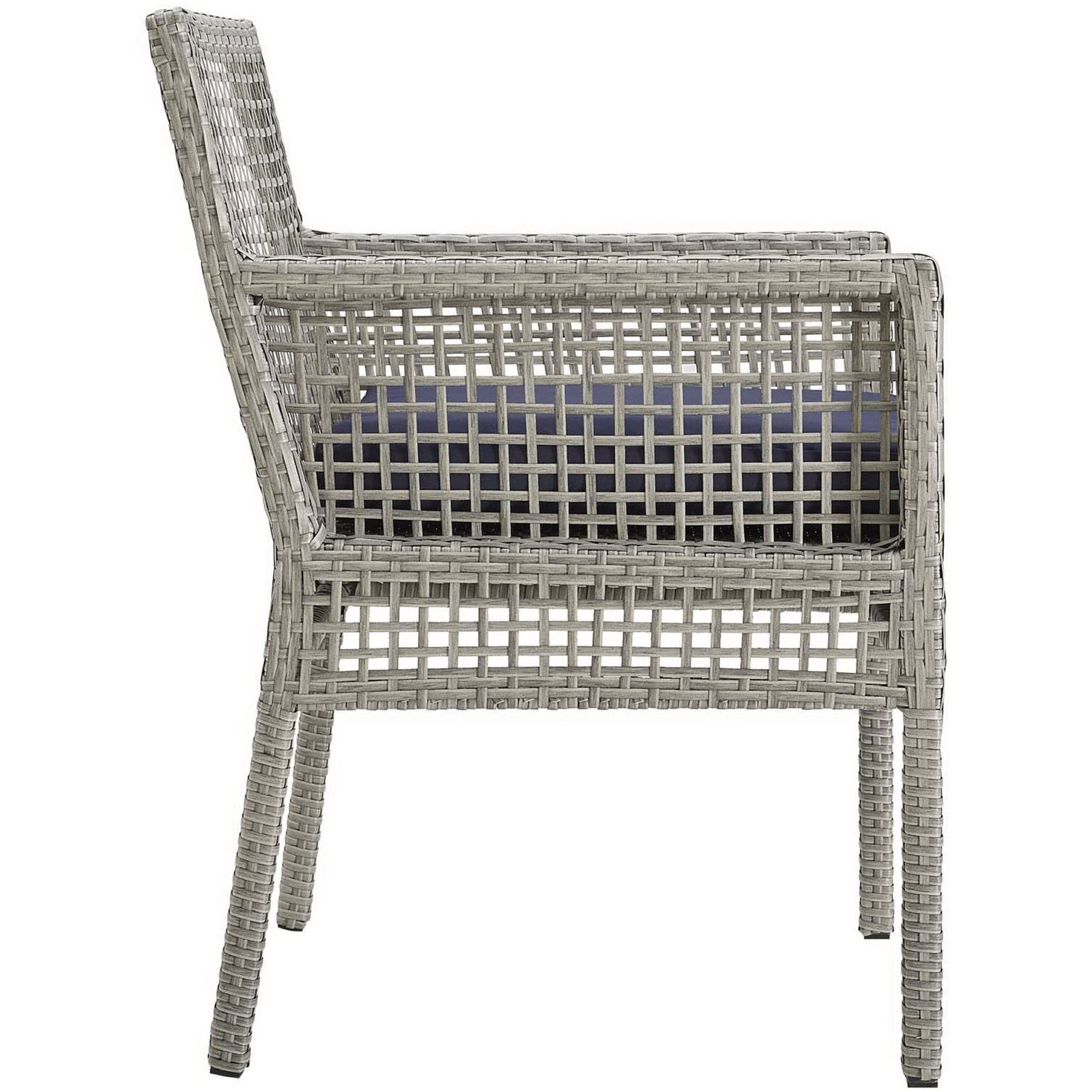 Clean-lined gray wicker frame and square arms pair with a navy cushion for a modern patio dining chair || EEI-2920-GRY-NAV || side_studio