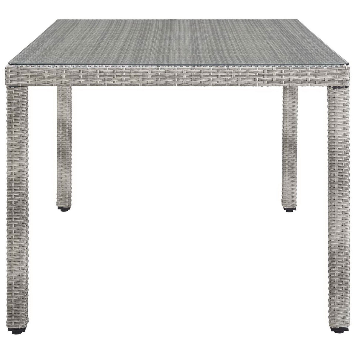 Spacious rectangular patio table showcasing sturdy gray rattan frame and glass tabletop || EEI-2921-GRY || side_studio