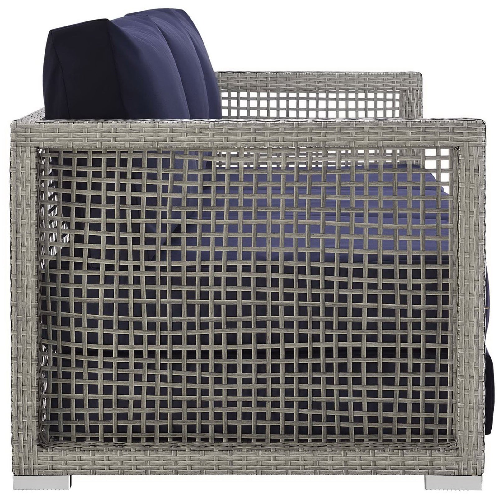 Gray rattan sofa with navy cushions emphasizing the open lattice side and structured seat cushions for clean lines || EEI-2923-GRY-NAV || side_studio