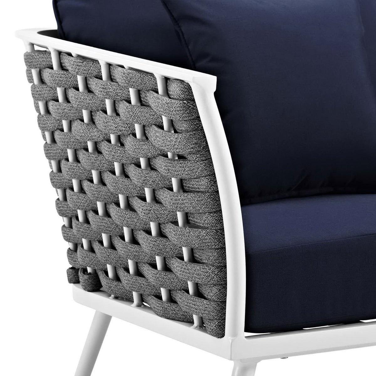 Navy cushion and textured charcoal rope arm of the Stance white outdoor armchair || EEI-3054-WHI-NAV || detail_studio