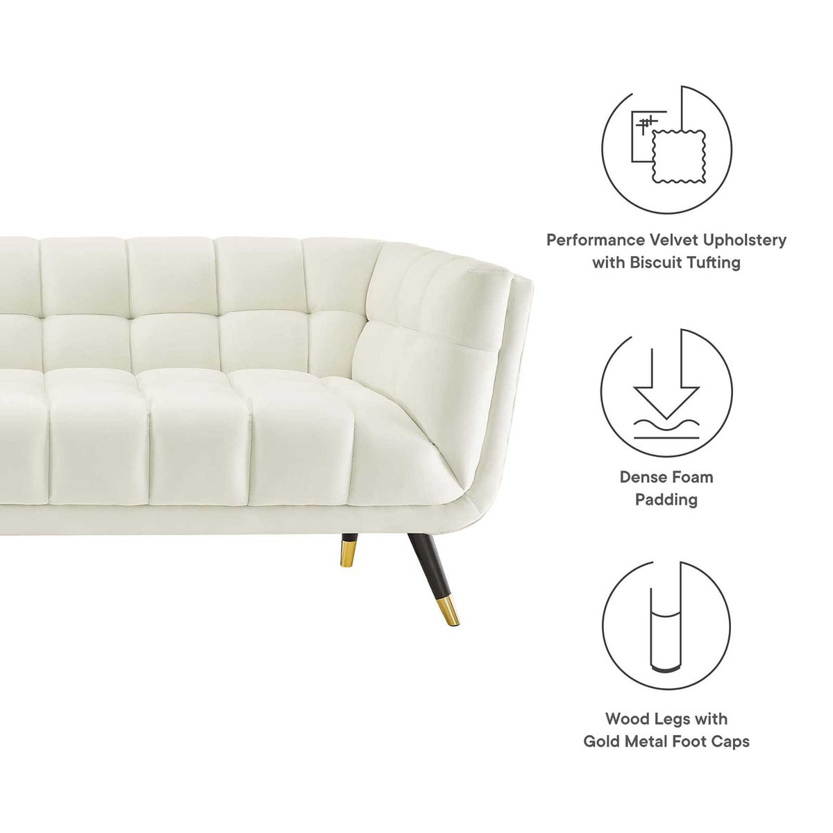 Biscuit-tufted performance velvet, dense foam padding and gold-capped wood legs add comfort and polish.