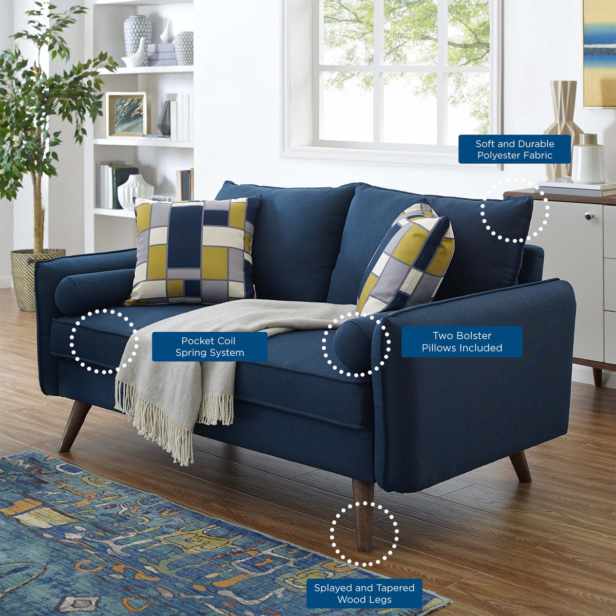 Polyester upholstery, pocket coil springs, bolster pillows, and splayed legs offer laid-back comfort.