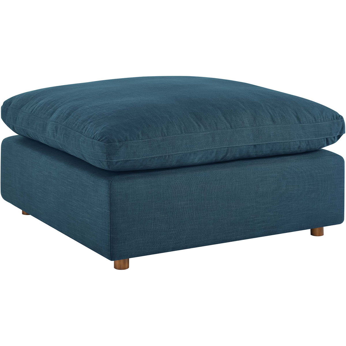 Linen-textured azure upholstery wraps a low ottoman with an inviting, overstuffed cushion || EEI-3318-AZU || front_angle_studio