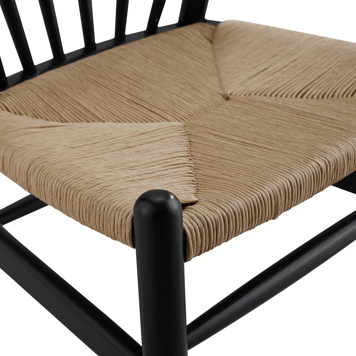 Tightly woven paper rope creates a textured seat framed by smooth black wood