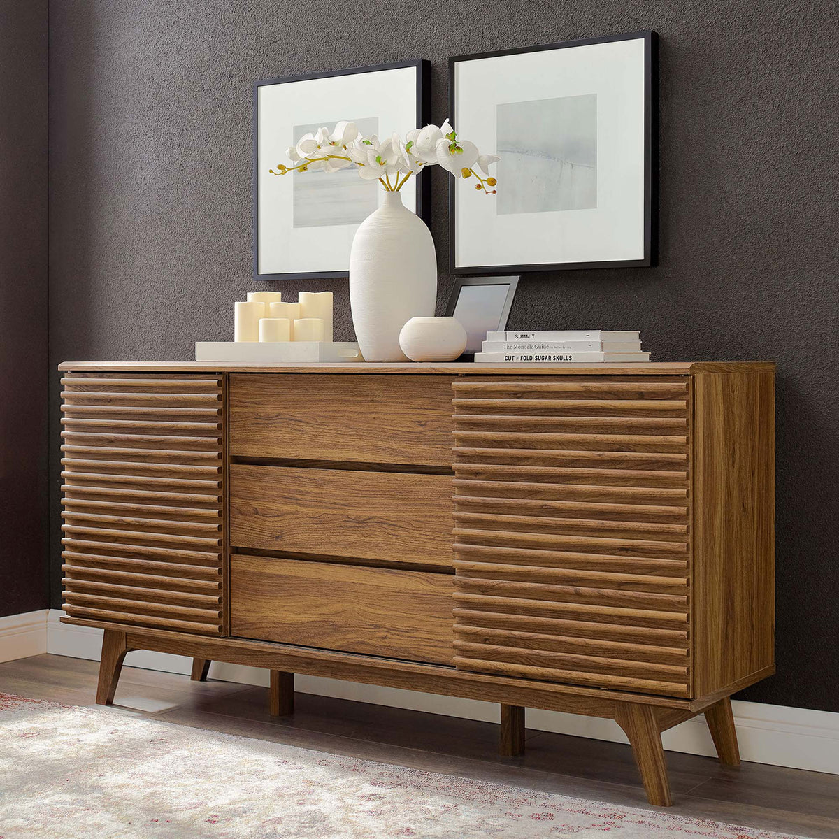 Walnut sideboard styled with ceramics and books, grounding a sophisticated living space || EEI-3344-WAL || front_angle_room