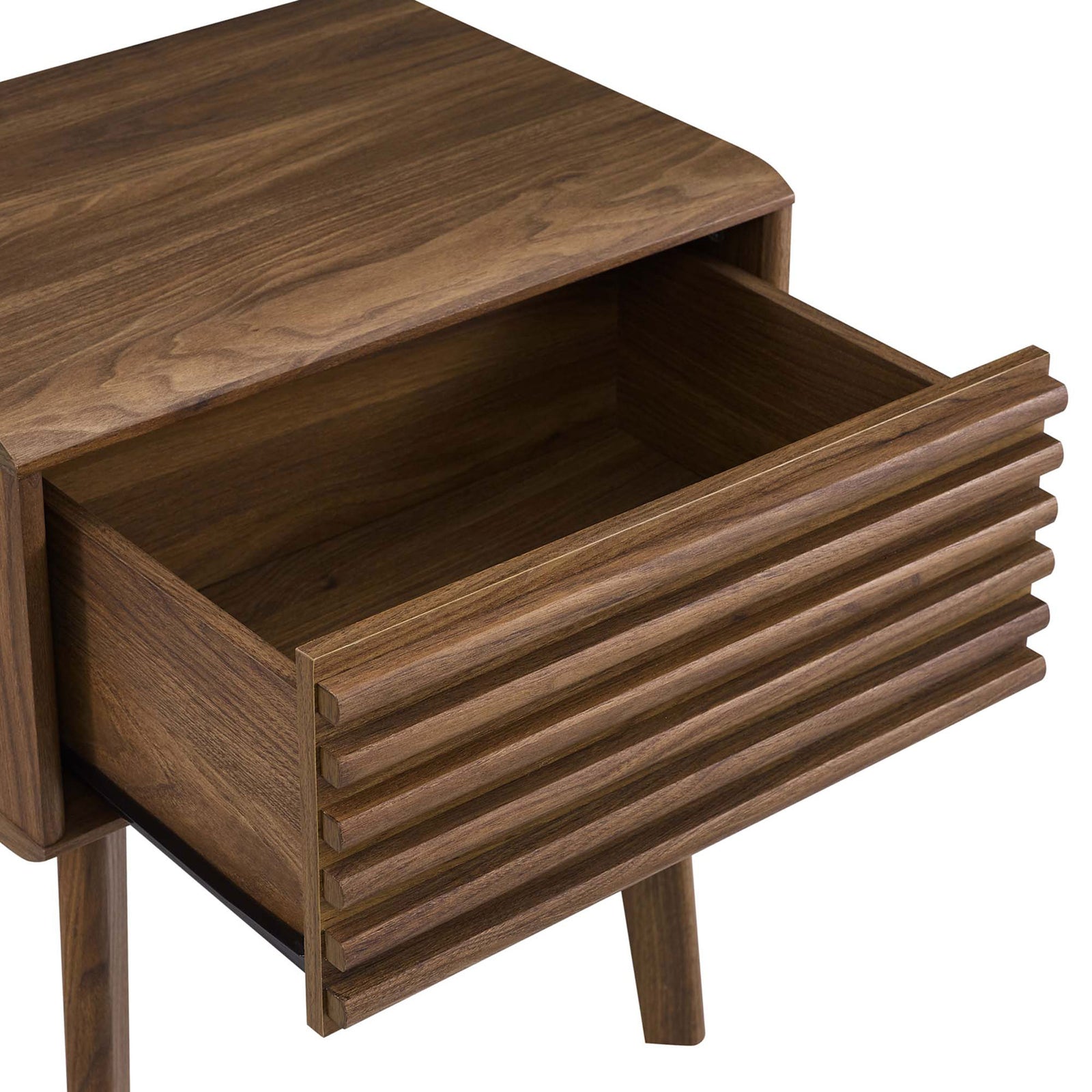 Full-extension drawer glides open to reveal generous storage space with matching walnut grain interior || EEI-3345-WAL || storage_open_studio